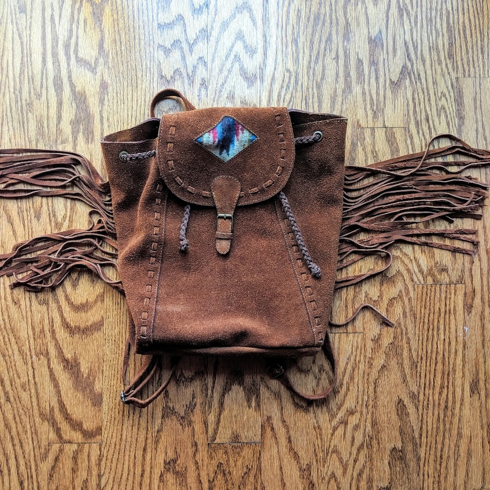 Brown leather fringe packpack